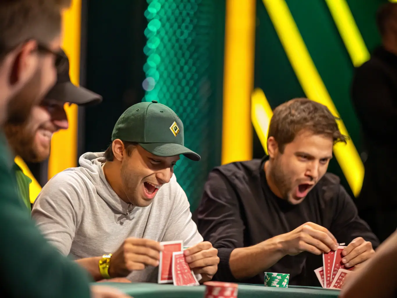 An image showcasing a poker table with players engaged in a game, emphasizing the skill and strategy required in poker.